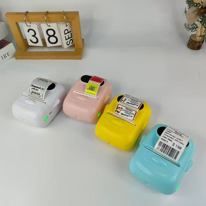 P50 Label Printer in pink – compact size shown next to nail polish